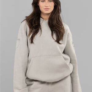 Women’s or men’s Comfrt travel essential hoodie. Stone